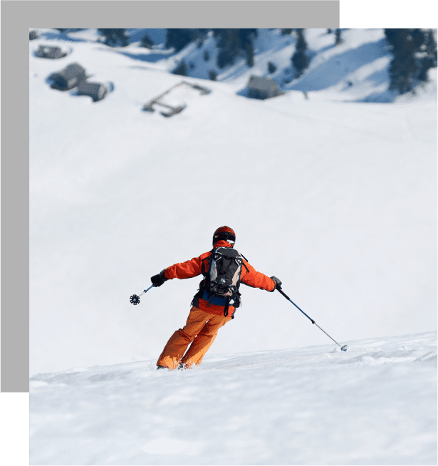 A person skiing down the side of a mountain.